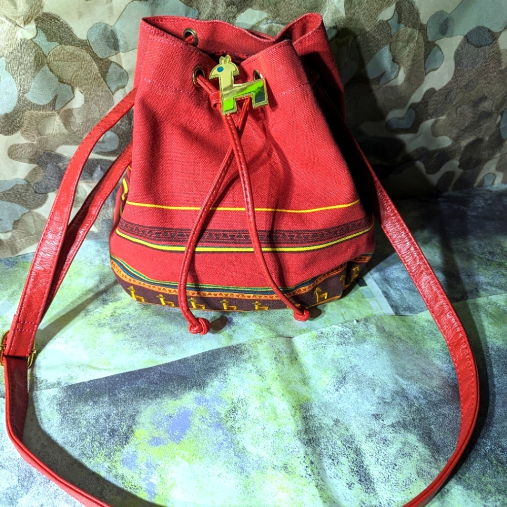 Emperor's New Groove Bucket Crossbody Drawstring Purse. Loungefly.